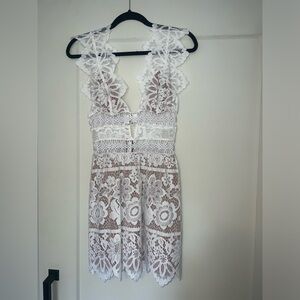 White lace For Love & Lemons dress.